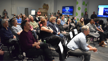 Audience seated in the Hive Media Lab